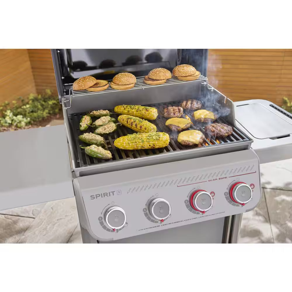 Spirit E-425 4-Burner Liquid Propane Gas Grill in Titanium with Premium Grill Cover